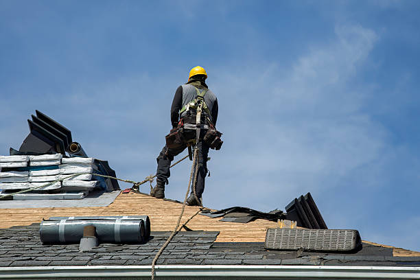 Professional Roof Replacement technician working in Groveland, MA